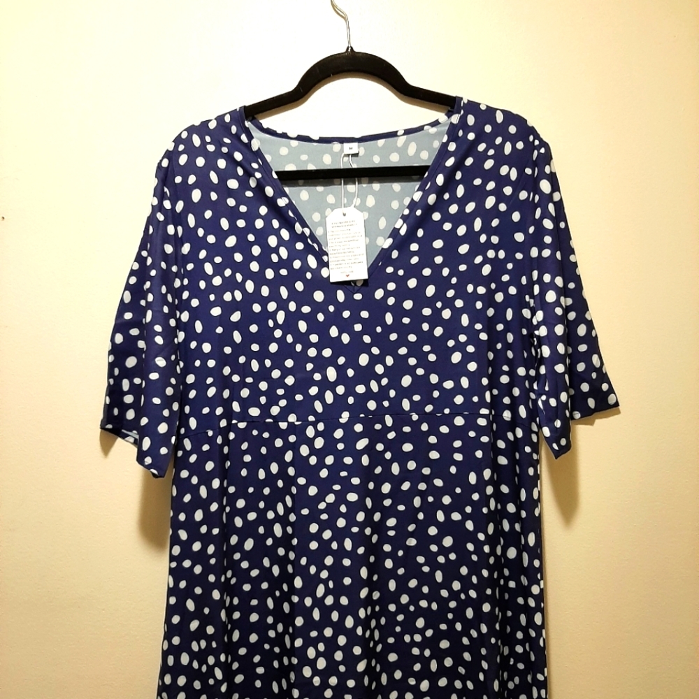 Long blue and white polka dot dress.